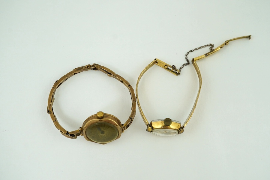 A lady's 9ct gold manual wind wrist watch, on a 9ct flexible bracelet, gross weight 17 grams and a lady's Rotary steel and gold plated wrist watch. Condition - poor to fair